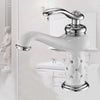Coco glam faucet - 4 / short - home & office. Silver faucet shines against all white room: sink, cupboards, even a marble statue. Clean lines, polished setting.