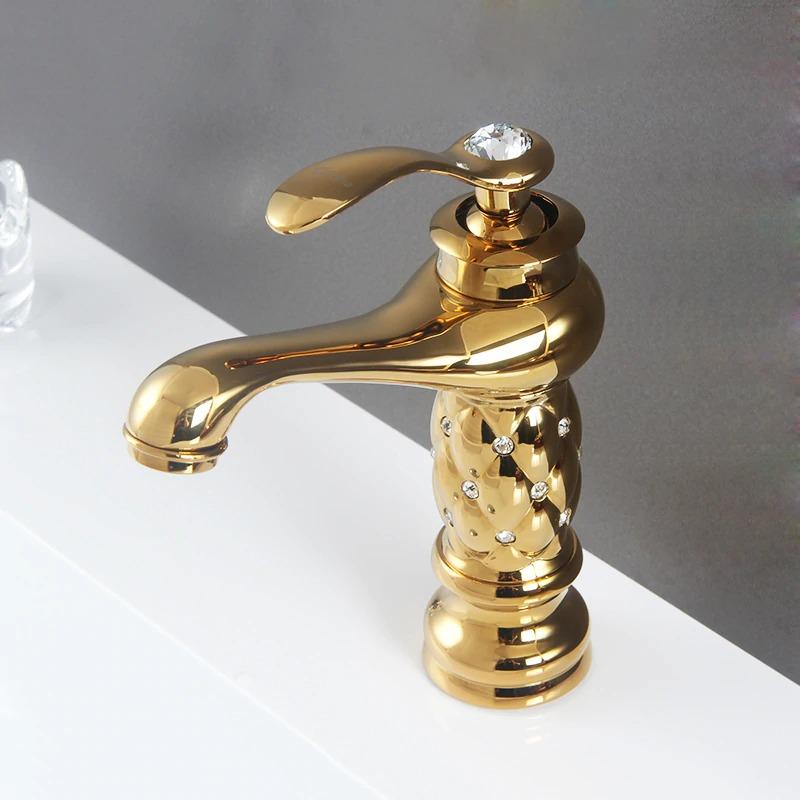 Coco glam faucet - 6 / short - home & office. Gold on gold faucet on white surface emphasises the sparkle of the embedded crystals, including the large one set in the hot/cold mixer lever