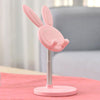 Load image into Gallery viewer, Pink Boston Bunny Phone Stand on pink cloth set against white and grey backdrop
