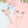 Pretty Flat lay of both Pink and White Ava portable humidifiers - Pink and Baby blue paper background 