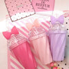 Belle bow cup - Pink, Hot Pink, Lavender Purple - Flatlay on colorful striped and dotted background