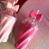 Hot Pink & Pink Belle bow cups flatlay - home & office