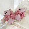 Pair of Matte Minimalist Paris Pink Belle Bow Case showing back of phone and linen bows