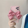 Matte Minimalist Paris Pink Belle Bow Case showing back of phone and linen bow