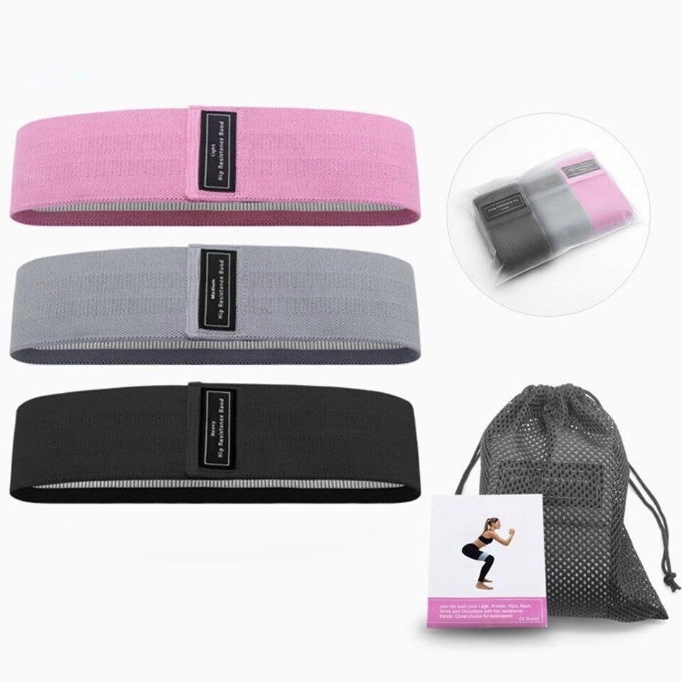 Blogger booty bands - pink & grey - accessories Bands on display in pink, grey and black. Also shown rolled in a clear plastic pouch. Mesh carrying bag and instruction pamphlet on display in bottom right of pic