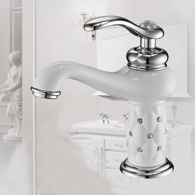 Coco glam faucet - 4 / short - home & office. Silver faucet shines against all white room: sink, cupboards, even a marble statue. Clean lines, polished setting.