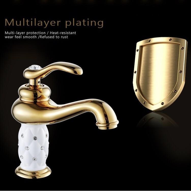 Coco glam faucet - home & office. The rust and wear-resistance of the gold and white faucet emphasised by contrast with a polished sturdy shield against a stark black background. Text reads "Multilayer plating; Multilayer protection, Heat-resistant wear feels smooth